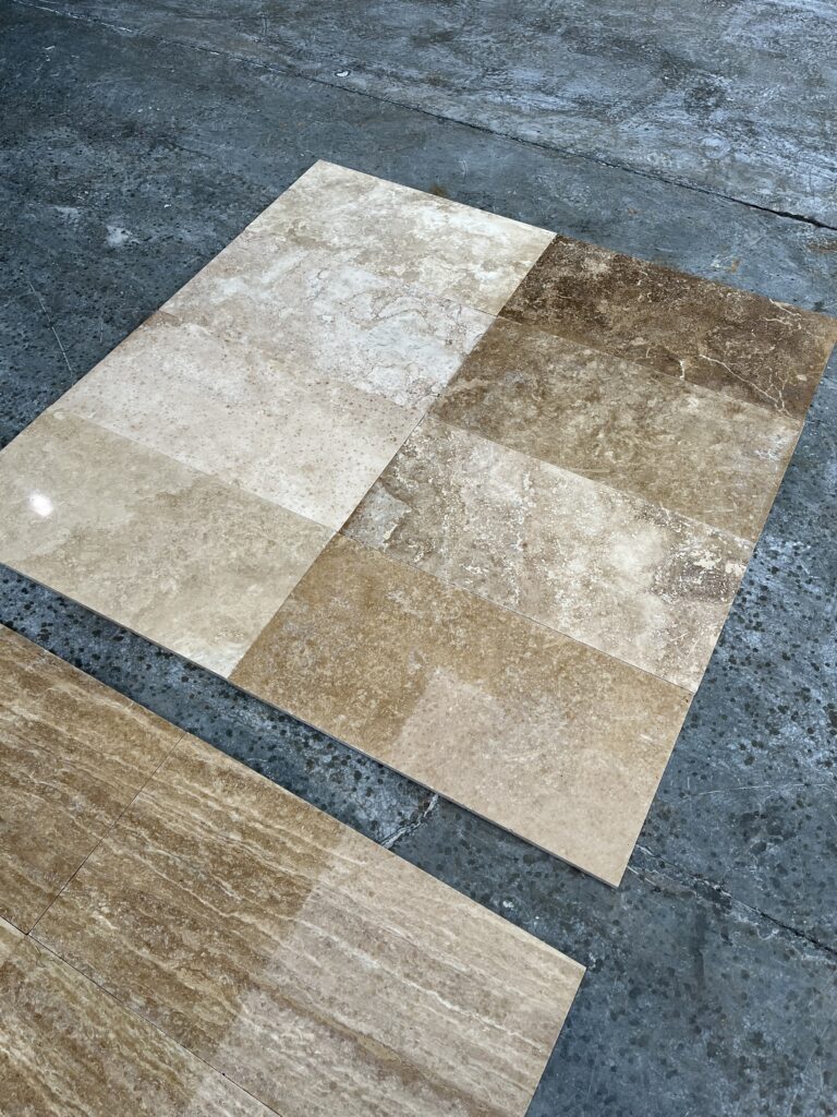 8 natural stone tiles floored together with cream,beige,brown an chocolate color.