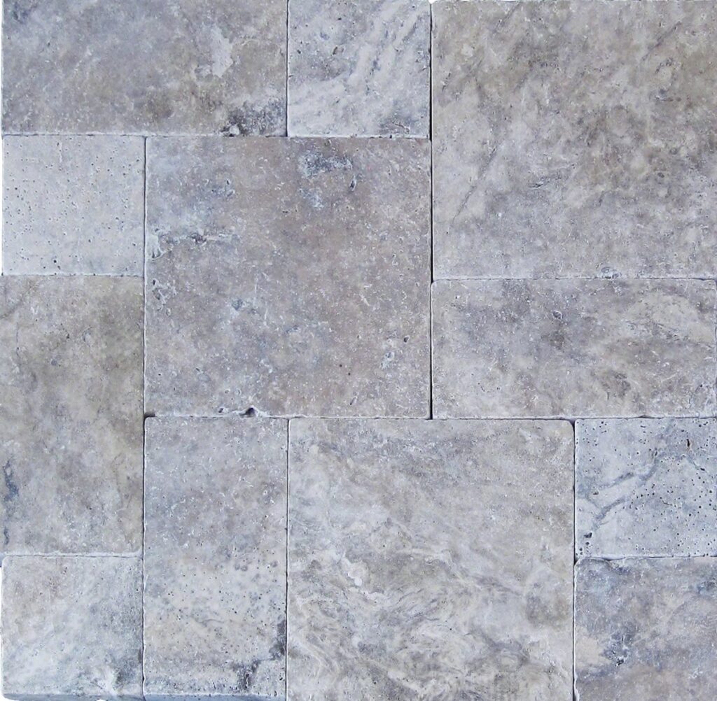 a picture of tumbled travertine wth gray color in french pattern flooring