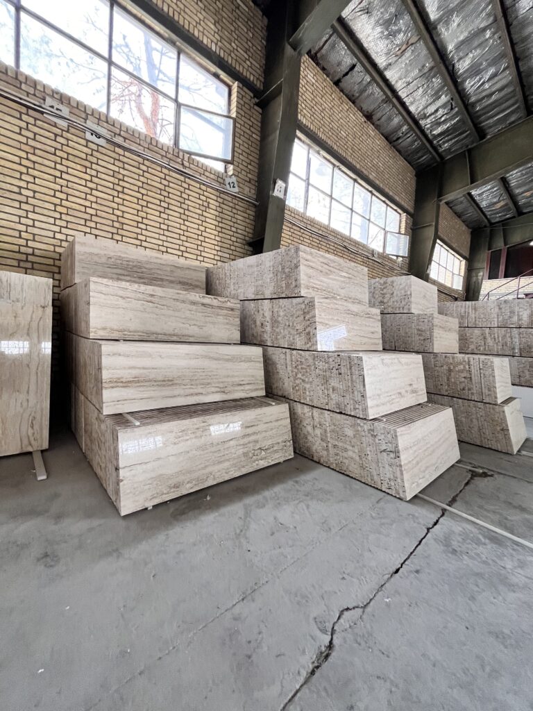 an image of 1.2 mm travertine tile rows in factory