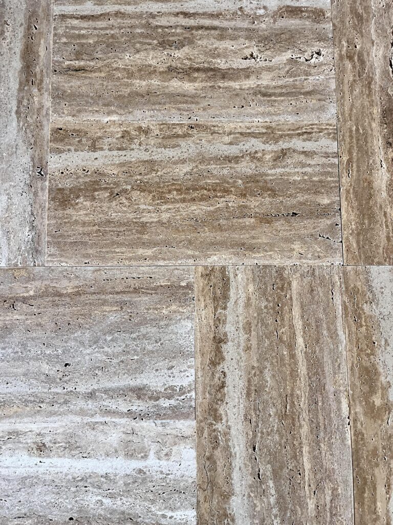 an image of 1.2 mm thickness vein cut noce travertine texture