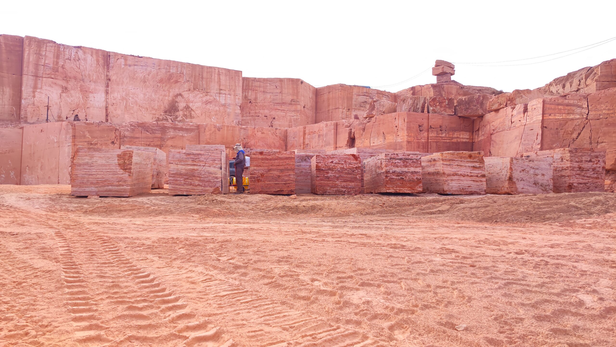 Red Titanium Travertine quarry in Iran, Showcasing the rich natural stone deposits