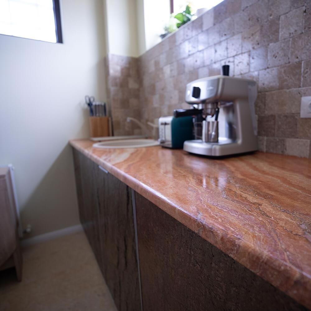 A shot from red travertine counter top