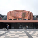 Red travertine application on exterior of a building picture