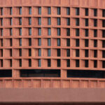 Red travertine exterior application on building